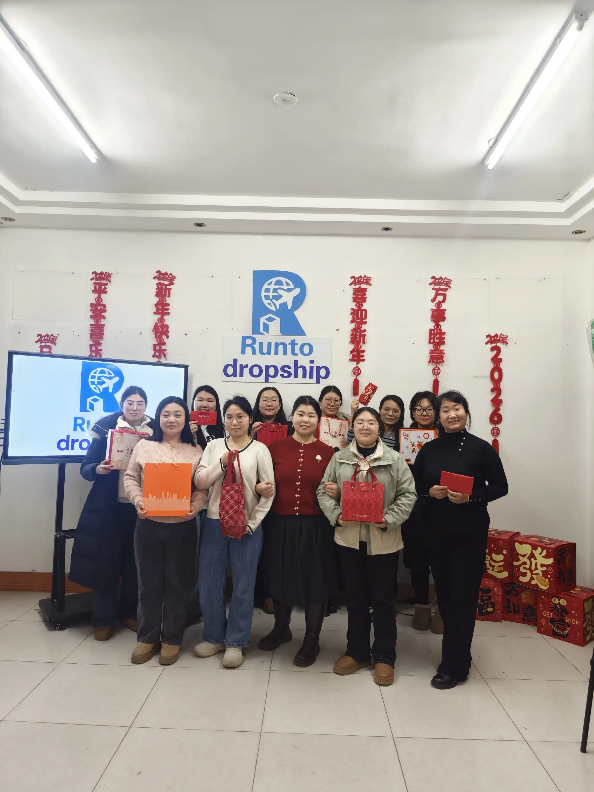 RuntoDropship team members from business sourcing after-sales and warehouse operations at a company event